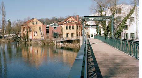 An einem idyllischen Abschnitt des Steyr-Flusses liegt das IVZ Museum Arbeitswelt im historischen Stadtteil Wehrgraben. 